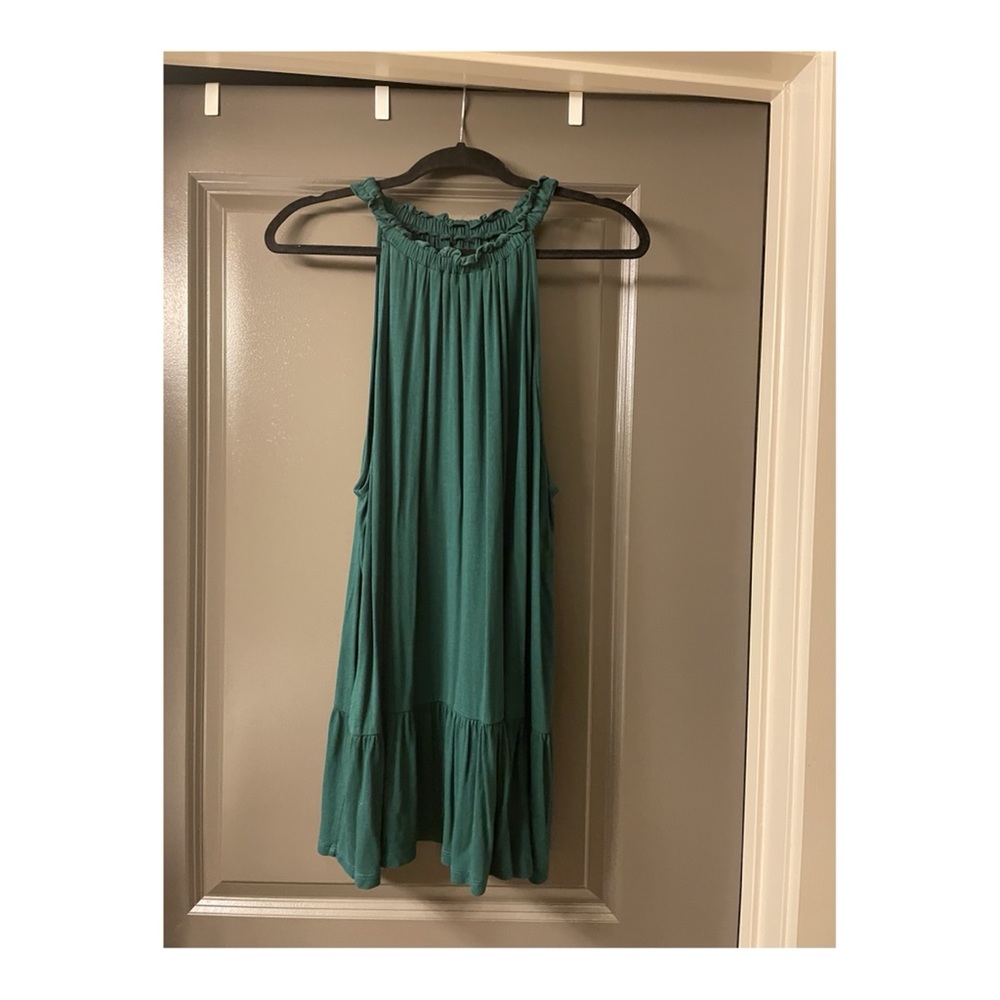 Green peplum tank